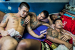 A quiet moment between inmates in Klong Prem prison on the outskirts of Bangkok, Thailand.