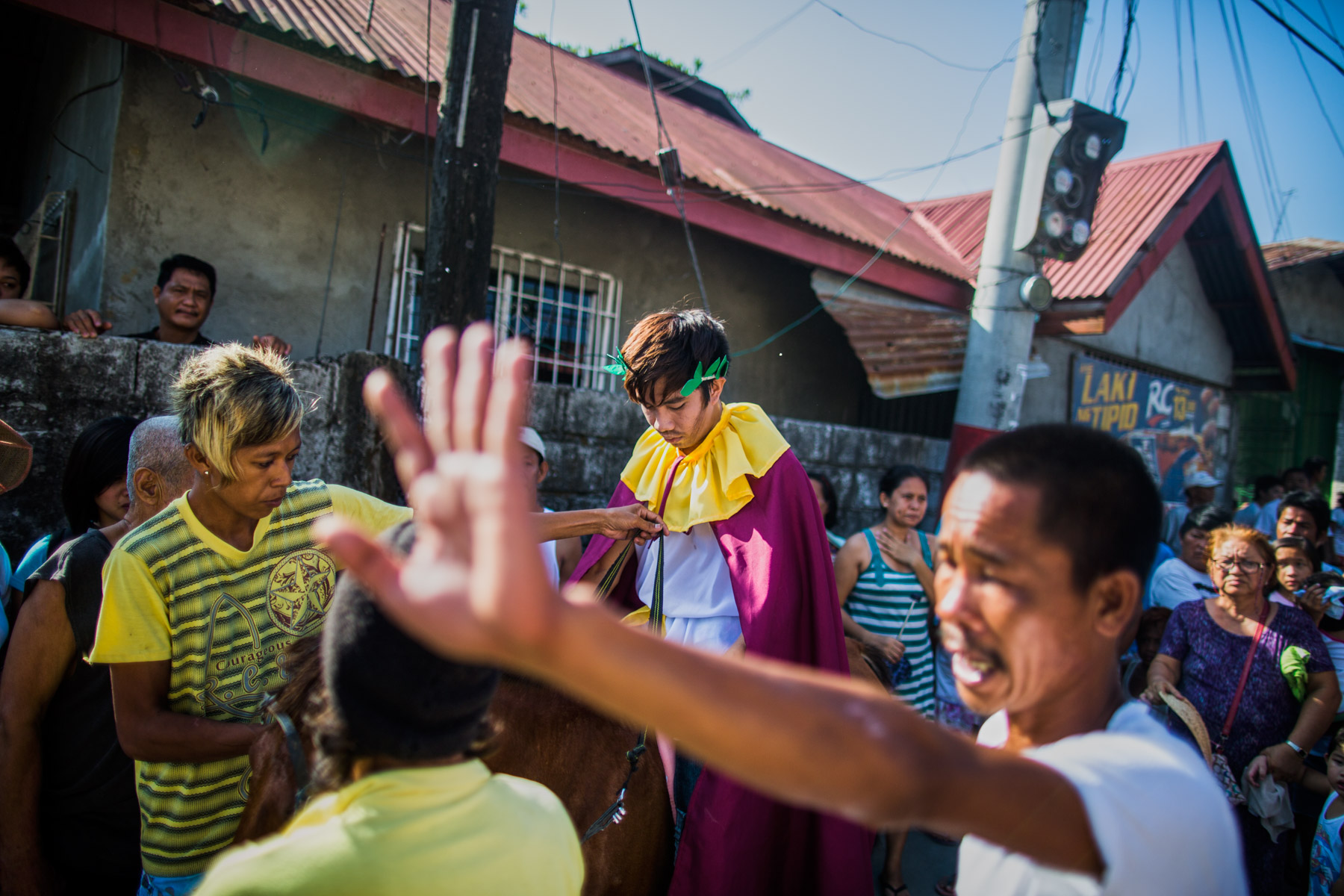 A procession of actors during the theatrical street play that is Holy Week in Pampagna, the Philippines.