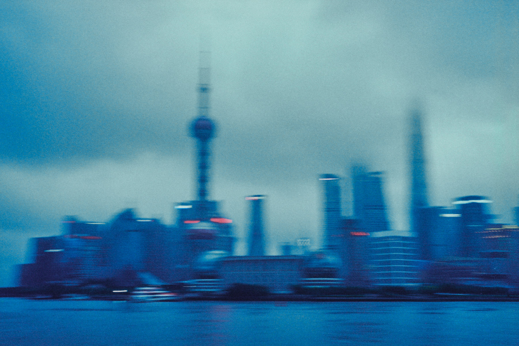 The Shanghai skyline at dusk.