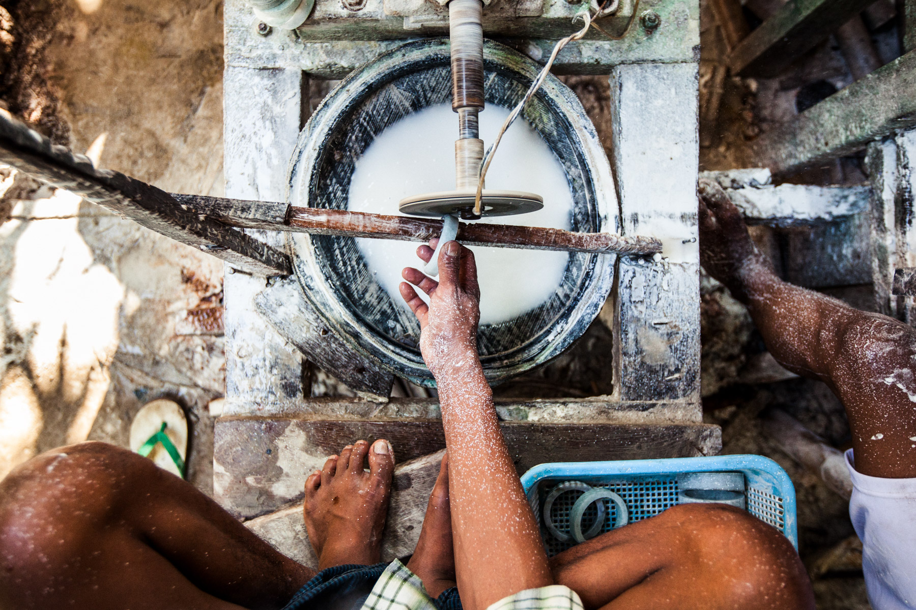 A man polishes a jade bracelet in Mandalay, Myanmar.