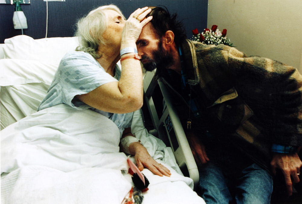 Hospitalized with terminal cancer Peter’s mother kisses him a final goodbye.