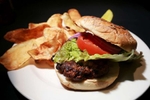 Clyde Burger. Piedmontese beef, wild boar and buffalo blend, lettuce, tomato and onion at Clydz in New Brunswick.