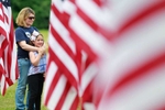 Patty Segal with her daughter Bridget Segal at A Field of Honor, 200 American flags is on display at River Road Park next to the Jacobus Vanderveer house in Bedminster. 