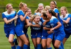 Gabby Alloe of Scotch Plains Fanwood is swarmed by teammates after scoring a goal against Summit. Scotch Plains won 4-1. 