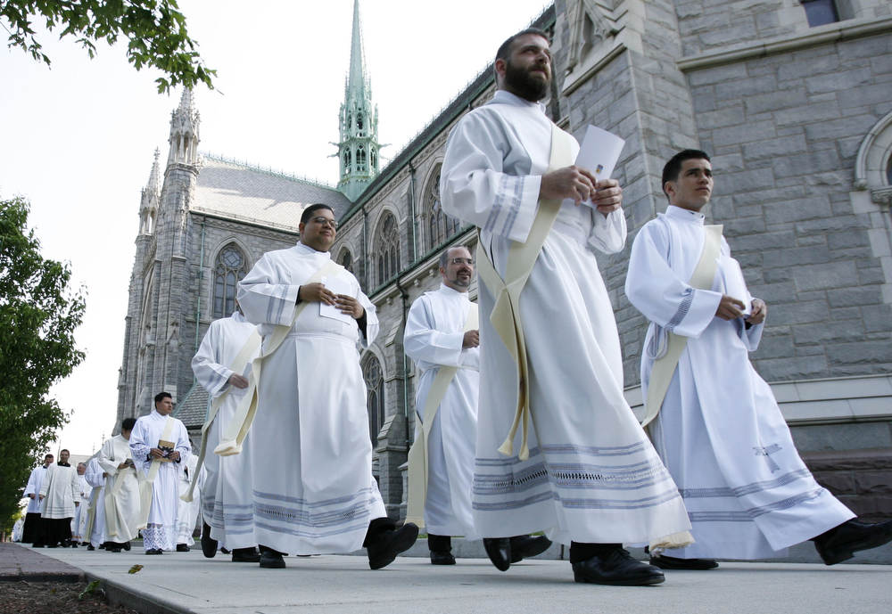 Thirteen (soon to be) priests make their way into the Basilica for their ordination as priests.  The Newark Archdiocese ordained 13 priests, the most in the nation this year, at the Cathedral Basilica of the Sacred Heart in Newark.