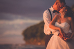 wedding photography of bride and groom embracing on beach at Camp Pioneer on Lake Erie at sunsetlake-erie-sunset-wedding-photography-camp-pioneer-buffalo-2
