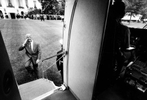 President Bill Clinton salutes as he boards the Marine One helicopter on the South Lawn of the White House. Photograph by Barbara Kinney, The White House