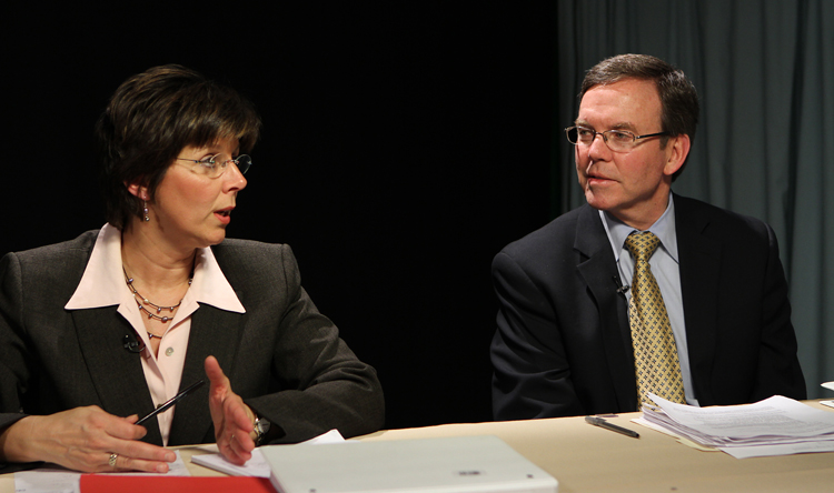 APRIL 6, 2011  School Committee Chairwoman Rebecca Robak, left, answers a question during the State of the Schools. Giving residents the opportunity to submit questions or call in during the production, the program was broadcast live from the studios of HCAM TV in Hopkinton, MA. At right is Superintendent John E. Phelan, Jr.