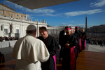 Pope Francis greets clergy and dignitaries during a general audience in Vatican City.