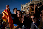 Pilgrims rejoice as Pope Francis approaches them during a general audience in Vatican City.