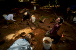 Archeologists dig in the cache site deep in the Mosquitia jungle of Honduras. They were uncovering a ceremonial site containing numerous stone carvings and vessels.