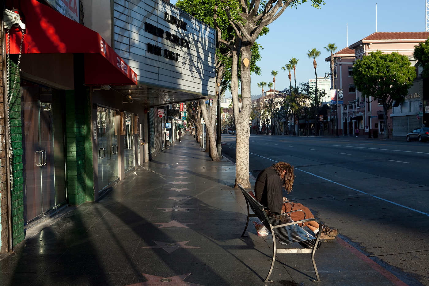 Homeless, early morning on Hollywood Boulevard, Line 302.
