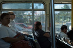 Passengers ride through Beverly Hills on Sunset Boulevard, Line 302.