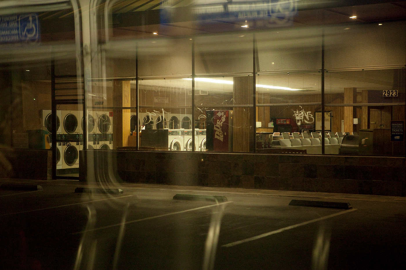 Laundromat, through the window of a Line 4 bus on Sunset Boulevard.