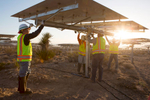 IVANPAH; CALIFORNIA; MAY 2012: A crew flips a heliostat to its stowed position near Tower One at sunrise at the Ivanpah Solar Project (photo Gilles Mingasson/Getty Images for Bechtel).