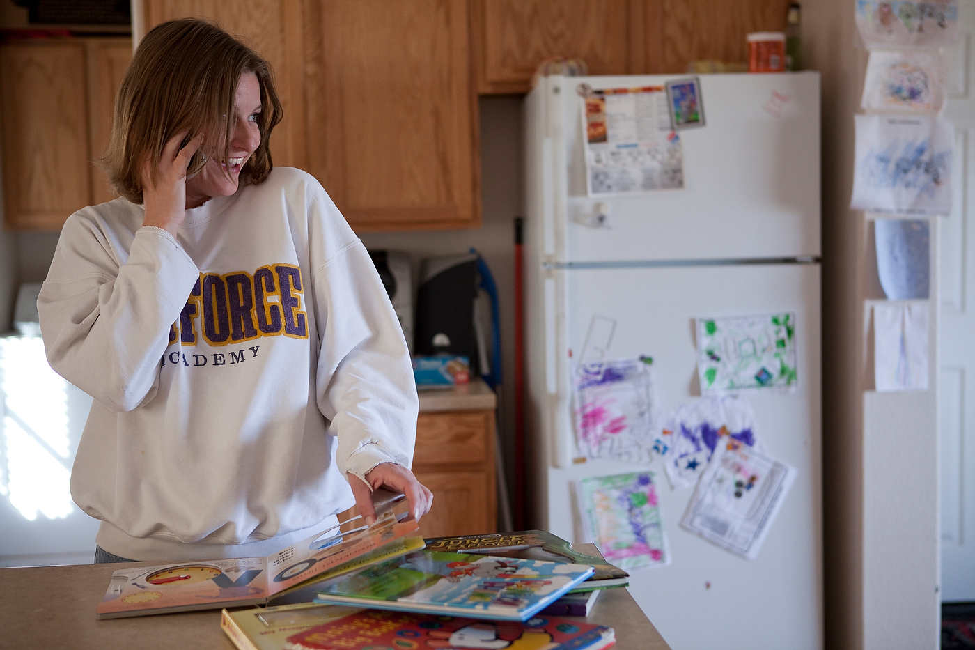 Scarlett Angel at the house she rents near the Love Ranch, surrounded by her children's drawings.