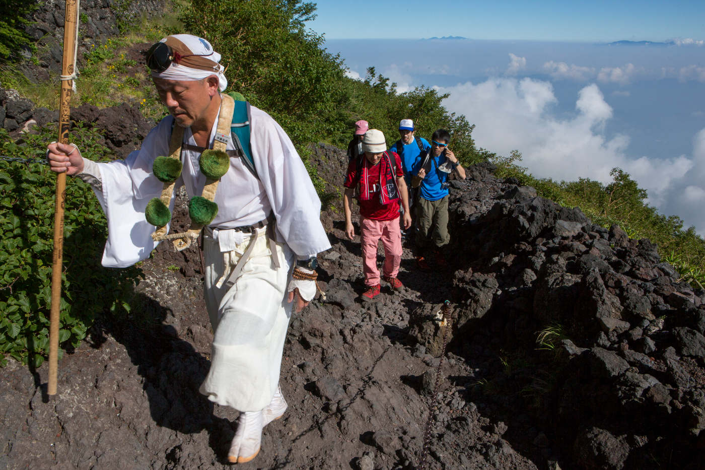 A traditionally dressed hiker on the Yoshida trail, Mount Fuji's most popular route.