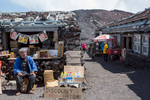 Souvenir stores greets hikers on Mount Fuji's 13,389 ft summit. 