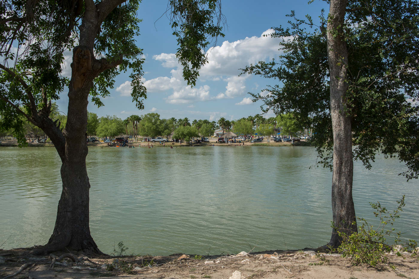 From Anzalduas Park, in the U.S., one can hear music and laughter from the Mexicam familes swimming in the Rio Grande.
