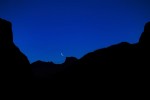 Crescent moon rises above Half Dome.  Picture is bordered by El Capitan on the left and Cathederal Rocks on the right.  This image was shot early morning before sunrise which occured 30 minutes later.  A once in a life time experience as the conditions were perfect.