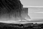 Black and White photograph of the seamist rising from teh waves at the base of the cliffs on the island of Hoy in the Orkneys