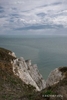 Colour photograph between a cleft in the chalk cliffs of teh English Channel at Beachy Head
