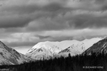 Black & White photograph of snow covered mountains of the Kluane Range.
