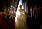 A bridal model makes a grand entrance during a wedding gown show in Milwaukee. 