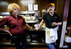 Kim Reinhard (left) and her husband Tom spend their last days working at The Rusty Skillet. The pair have worked there as waitress and chef for the past 12 years, and their three teenage children are employed there as well. The service industry has been his especially hard with the recession, and the restaurant will be closing it's doors, leaving the entire family of 5 out of work.