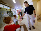 With the loss of the family income, many parents are not able to continue sending their children to private schools. A sharp decline in enrollment in the past few years is forcing schools like Holy Angels School in West Bend to make tough decisions. Holy Angels will be combining many of their classes with another private school that is also struggling. School principal Mike Sternig gives high fives to students in the hallway. 