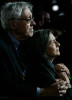 A couple holds one another as they listen to President-elect Obama's address.