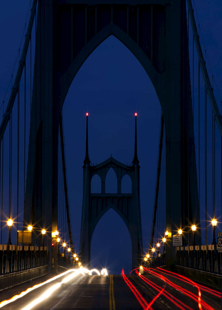 The St. Johns Bridge in Portland is a steel suspension bridge crossing the Willamette River. The Gothic-styled bridge took 21-months to build and was dedicated in 1931. 