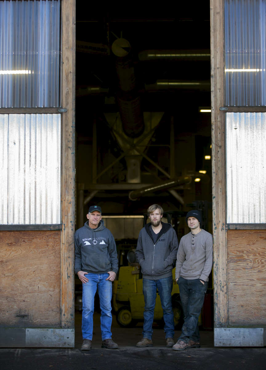 Mike Redmond (left), with his sons Blake (center) and Joseph at Creative Woodworking NW Inc in the Central Eastside of Portland.