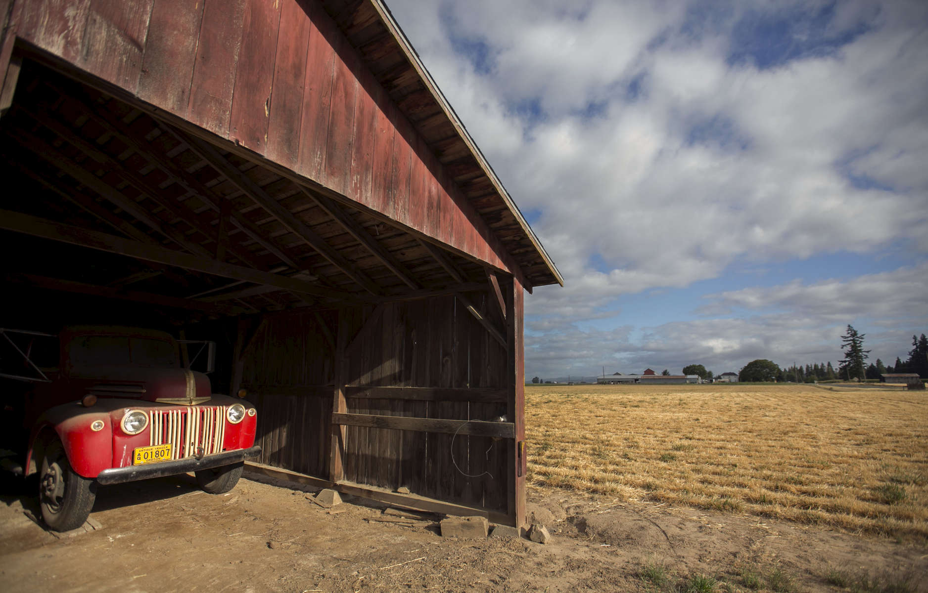 The chicken barn is now only used for storage, one of many outbuildings on the 1915 Taghon farm in Cornelius, founded in by Theophile Cappoen, and is now owned by Theophile's great-great-grandson Joe Finegan and his wife Jennifer.  
