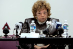Denise Revels Robinson, director of the Bureau of Milwaukee Child Welfare, sits surrounded by microphones at an emergency meeting of the Milwaukee Child Welfare Partnership Council. Robinson stepped down from her position following the ensuing investigation into Christopher's death which showed a complete breakdown of social worker protocols.