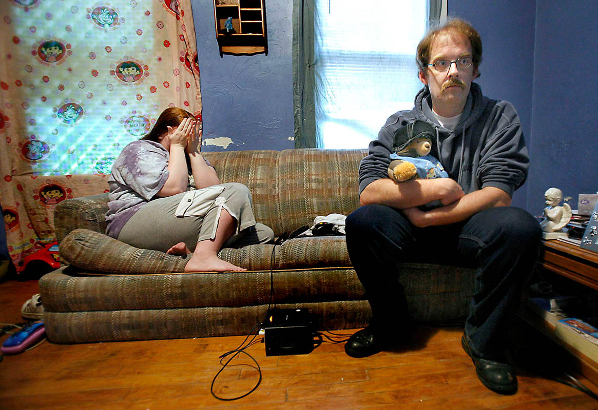 The Whitman family, Robert, right, and his wife Valissa are still awaiting the cause of death of their son. Whitman has dressed the baby's stuffed bear in his clothing and takes it with him when leaving the house. {quote}This is as close as we can get to him now,{quote} says Whitman. 