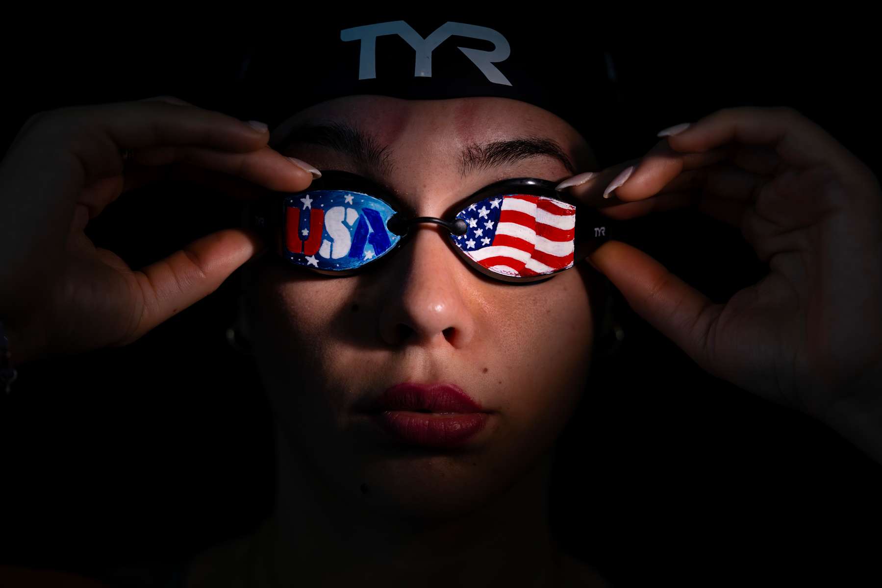 United States Paralympian Anastasia Pagonis poses for a portrait at Farmingdale School District Aquatics Center on May 28, 2024 in Farmingdale, New York. Pagonis has autoimmune retinopathy which led her sight to decrease at the age of 11, and she lost her vision by the age of 14.  She competed in the swimming competition at the Tokyo 2020 Paralympic Games where she won a gold and bronze medal respectively in the 400m Freestyle S11 and 200-meter Individual Medley S11.  An S11 athlete is the most severe form of visual impairment. S11 swimmers all swim with blacked-out goggles to ensure a level playing field, blocking out all light so it's like swimming with a blindfold.  This is why they typically swim on the lane line and have tappers to inform them when they need to turn or stop.  She will be competing in the 400m Freestyle S11 at the 2024 Paralympic Games this summer in Paris, France.  