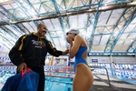 United States Paralympian Anastasia Pagonis speaks with her coach Darryn Solotoff during a training session at Nassau County Aquatic Center on May 25, 2024 in East Meadow, New York.  Pagonis has autoimmune retinopathy which led her sight to decrease at the age of 11, and she lost her vision by the age of 14.  She competed in the swimming competition at the Tokyo 2020 Paralympic Games where she won a gold and bronze medal respectively in the 400m Freestyle S11 and 200-meter Individual Medley S11.  An S11 athlete is the most severe form of visual impairment. S11 swimmers all swim with blacked-out goggles to ensure a level playing field, blocking out all light so it's like swimming with a blindfold. She will be competing in the 400m Freestyle S11 at the 2024 Paralympic Games this summer in Paris, France.