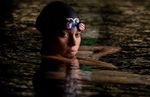 United States Paralympian Anastasia Pagonis poses for a portrait at Farmingdale School District Aquatics Center on May 23, 2024 in Farmingdale, New York.  Pagonis has autoimmune retinopathy which led her sight to decrease at the age of 11, and she lost her vision by the age of 14.  She competed in the swimming competition at the Tokyo 2020 Paralympic Games where she won a gold and bronze medal respectively in the 400m Freestyle S11 and 200-meter Individual Medley S11.  An S11 athlete is the most severe form of visual impairment. S11 swimmers all swim with blacked-out goggles to ensure a level playing field, blocking out all light so it's like swimming with a blindfold.    She will be competing in the 400m Freestyle S11 at the 2024 Paralympic Games this summer in Paris, France. 