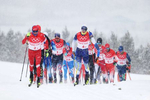 ZHANGJIAKOU, CHINA - FEBRUARY 13: Alexey Chervotkin of Team ROC (L) and Oskar Svensson of Team Sweden compete during the Men's Cross-Country Skiing 4x10km Relay on Day 9 of the Beijing 2022 Winter Olympics at The National Cross-Country Skiing Centre on February 13, 2022 in Zhangjiakou, China. 