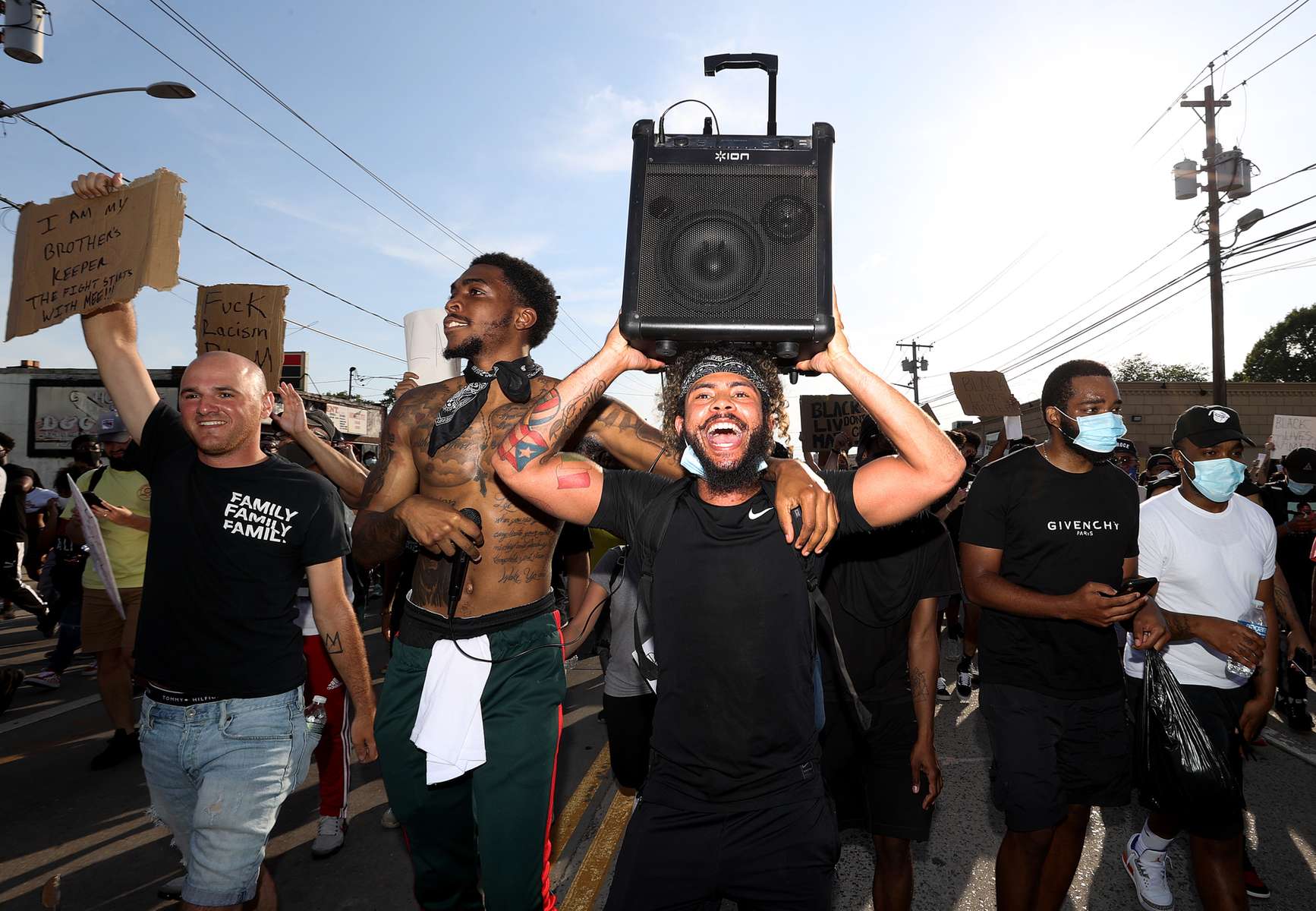 Protesters march to demonstrate the death of George Floyd on June 04, 2020 in Merrick, New York.  Minneapolis Police officer Derek Chauvin was filmed kneeling on George Floyd's neck. Floyd was later pronounced dead at a local hospital. Across the country, protests against Floyd's death have set off days and nights of rage as its the most recent in a series of deaths of black Americans by the police.  
