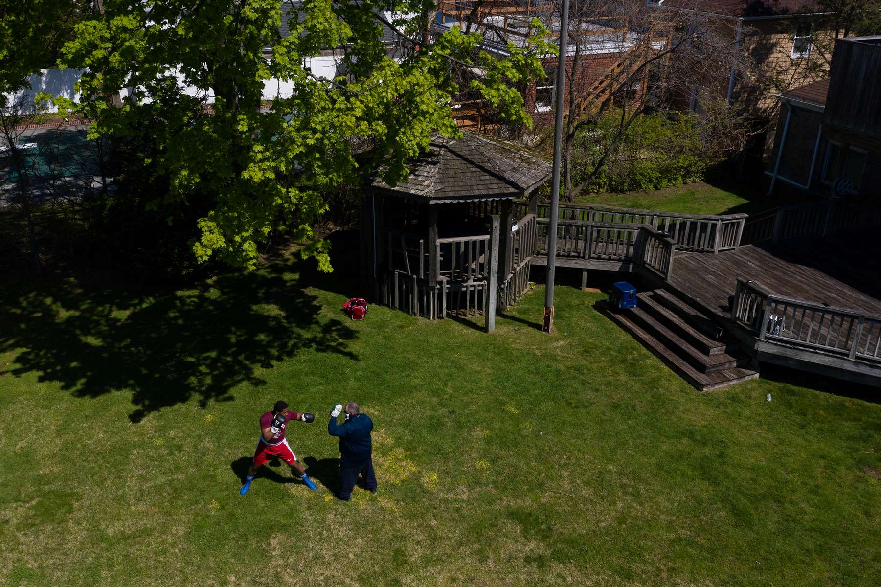 An aerial view of amateur Middleweight boxer Kevens Desroches training in the backyard with Westbury Boxing Club Trainer Matt Happaney on May 02, 2020 in Mineola, New York.  Local Amateur Boxers have continued To train as best they can during coronavirus COVID-19 Pandemic.  The World Health Organization declared coronavirus (COVID-19) a global pandemic on March 11th. 