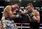 David Lemieux knocks the mouthpiece out of Marcos Reyes mouth during their middleweight bout at T-Mobile Arena on May 6, 2017 in Las Vegas, Nevada.  