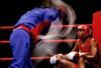 Helis Yanez of Venezuela sits in his corner during the boxing competition at the Pan American Games on August 1, 1999 in Winnipeg, Manitoba, Canada