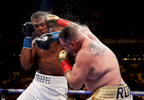 Andy Ruiz Jr  punches Anthony Joshua after their IBF/WBA/WBO heavyweight title fight at Madison Square Garden on June 01, 2019 in New York City. 