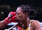 Mia Ellis receives a punch by Mia Ellis during their Lightweight fight at Barclays Center on May 28, 2022 in Brooklyn, New York. 