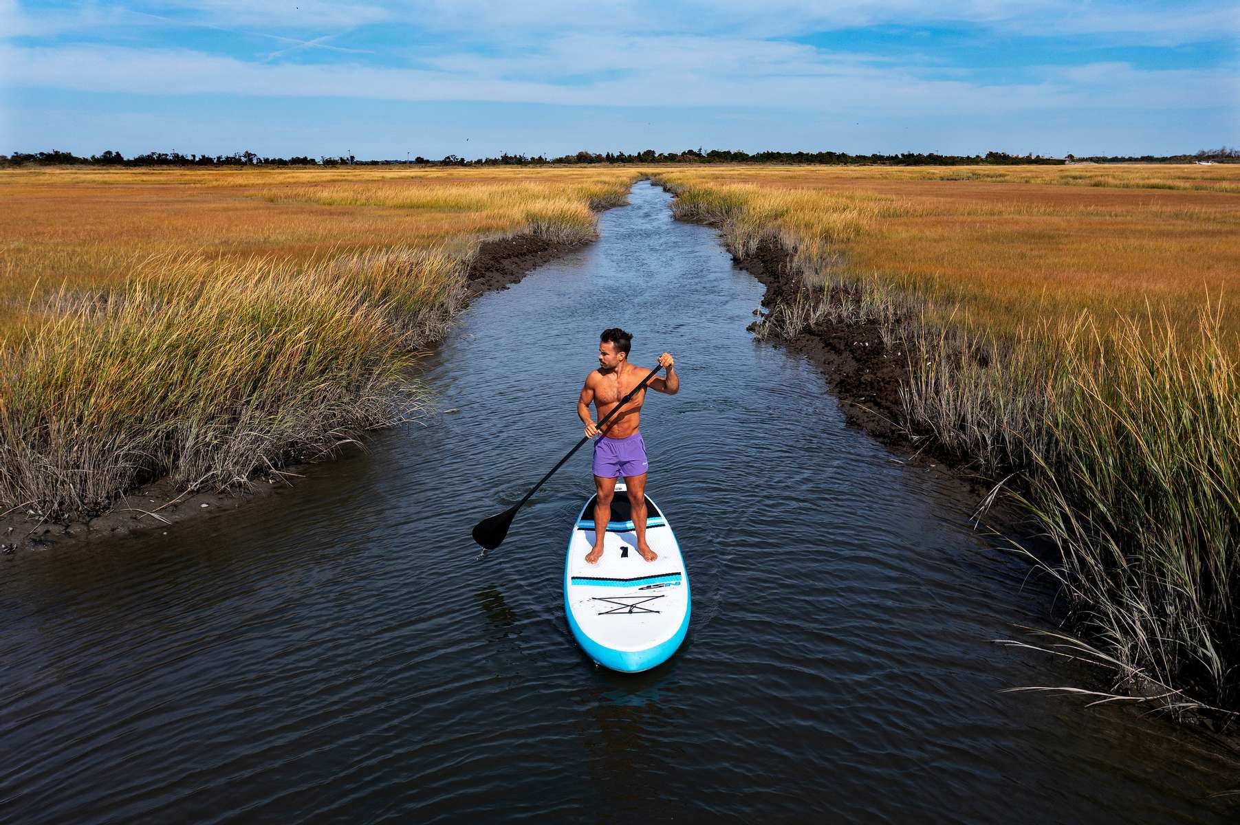 An aerial photo of Dennis Guerrero who is a CrossFit athlete, and owner of Life Outside the Box (LOTB) virtual training  Paddle Boards on October 2, 2021 in Point Lookout, New York.  