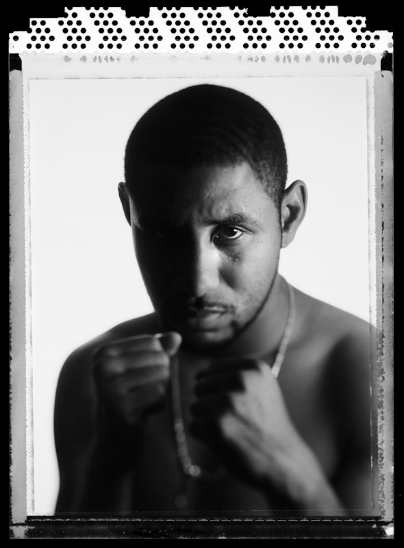 Diego Corrales, WBC Lightweight Champion poses for a portrait on June 11, 2005 at The International Boxing Hall of Fame in Canastota, New York.  He started his pro career in 1996 and is presently active.  He is 27 years old at the time of this photo.