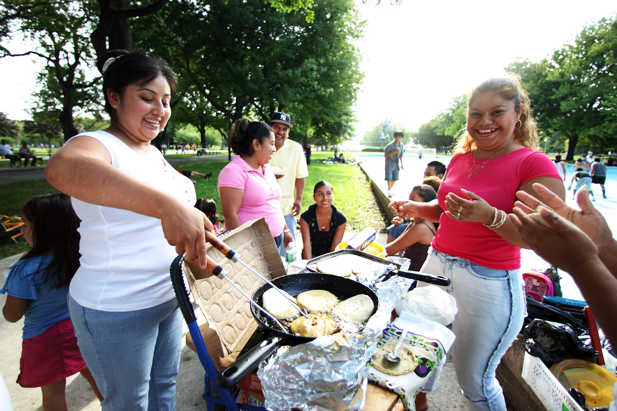 Families cook their ethnic food in the park as the Competitors participate in the Fedeiguayas Soccer League on August 26, 2007 at Flushing Meadows Park in Queens,  New York.