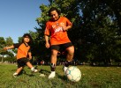 Jose Orellana and his son Jhair of El Salvador now living in Queens play soccer before Jose's Fedeiguayas Soccer League game on September 2, 2007 at Flushing Meadows Park in Queens, New York. 